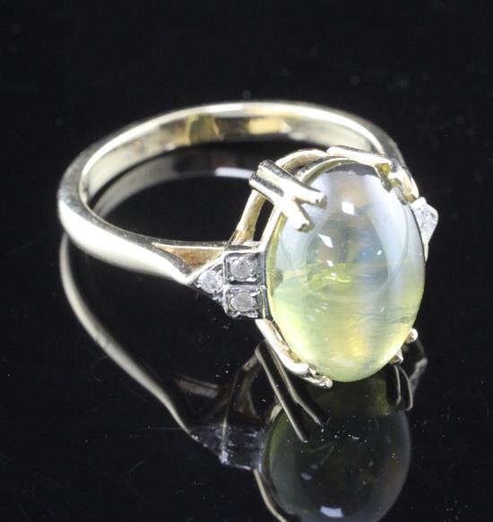 A 9ct gold, cats eye chrysoberyl and diamond ring, size O.